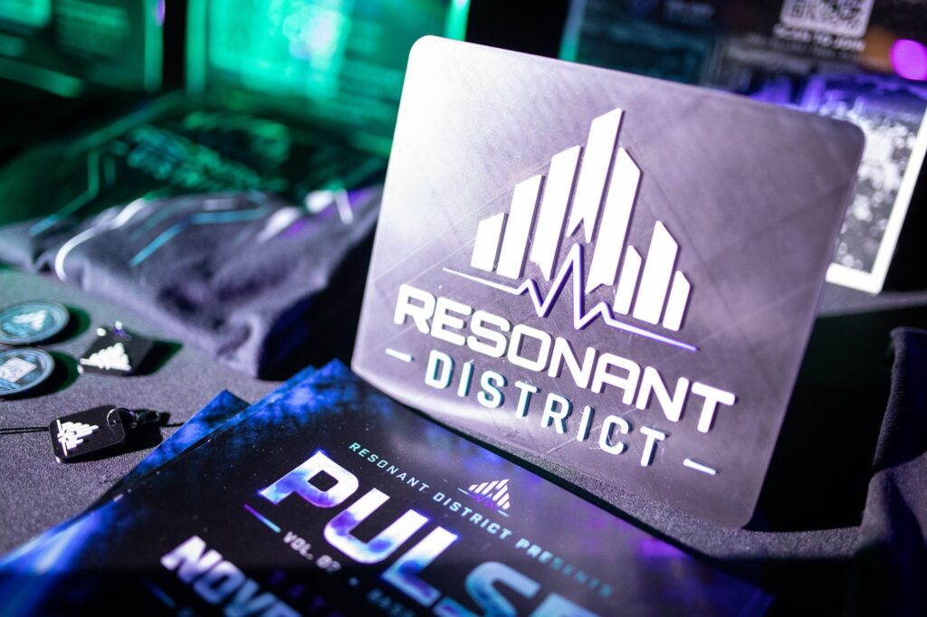 Resonant District card and PULSE branding at the door, Oct 10, 2026